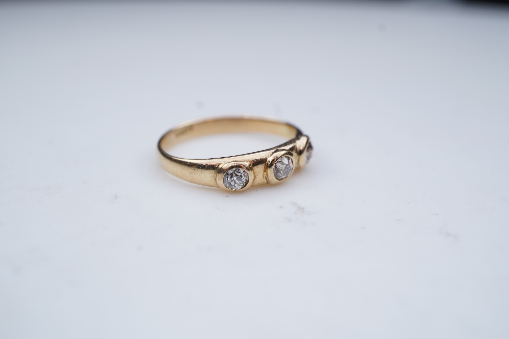 A three-stone diamond ring